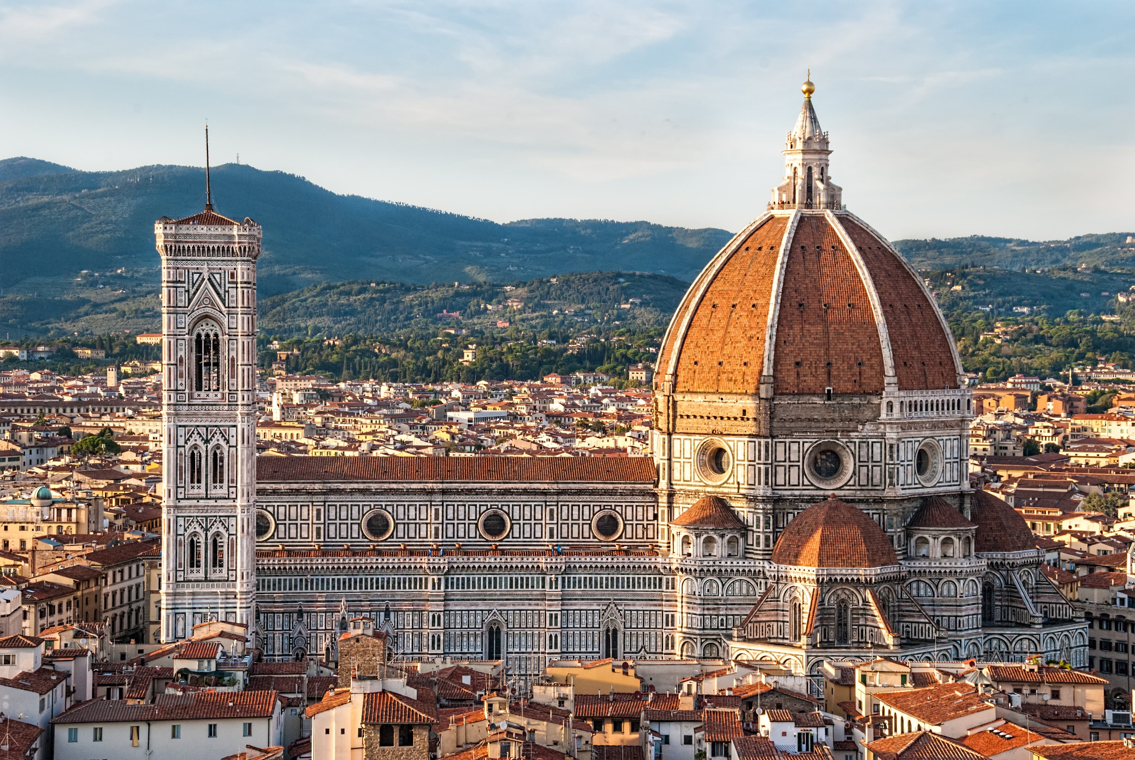 Brunelleschi's dome of Florence Cathedral rising over the city's terracotta rooftops -- engineered to hold itself up without the centering scaffolds his contemporaries thought were unavoidable